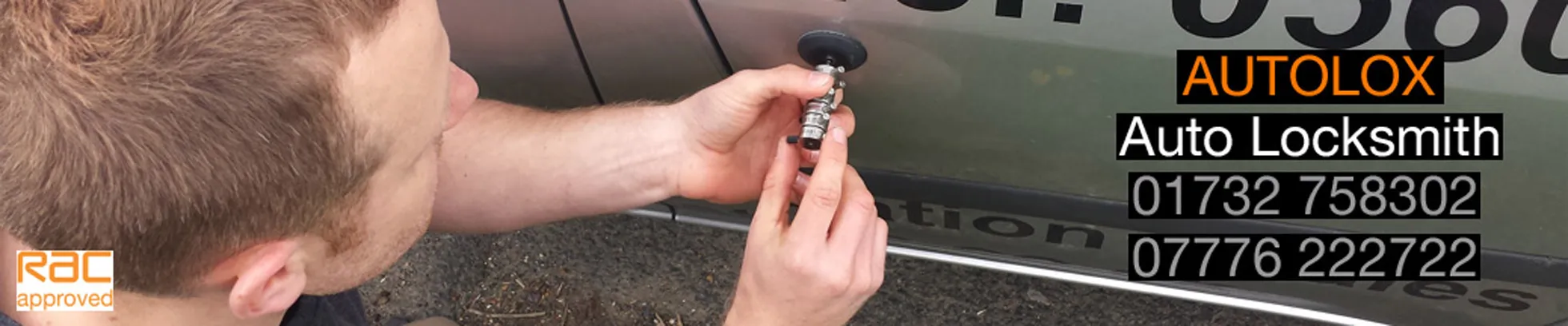 An auto locksmith making new keys to a Ford Transit van.